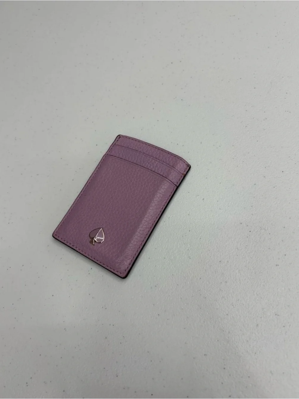 Kate Spade New York lilac leather card holder with textured pebbled finish
